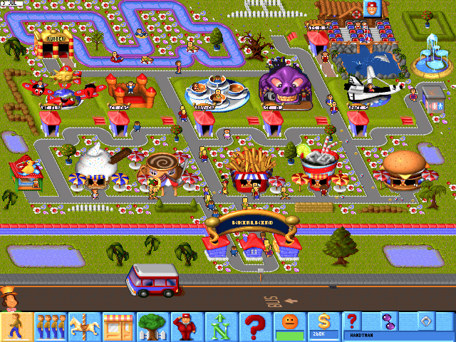 A screenshot of Theme Park for DOS. We see the entrance of a bustling theme park, opening into a row of food and drink stands and a series of rides beyond.