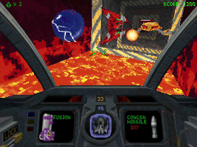 A screenshot from Descent. Another difficult game to describe; We are looking out of the cockpit of a small spacecraft, while flying over a pool of lava and being attacked by an enemy ship that looks like a flying orange crab. A blue orb crackles with electricity nearby - perhaps some form of power-up?